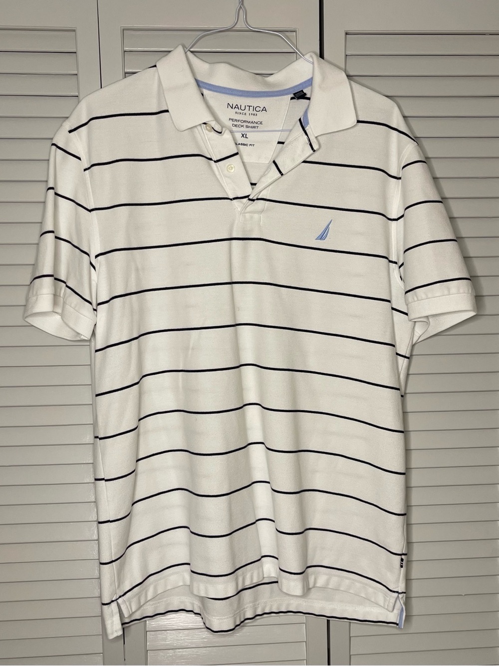 Nautica White Polo with Navy Stripes and Light Blue Logo